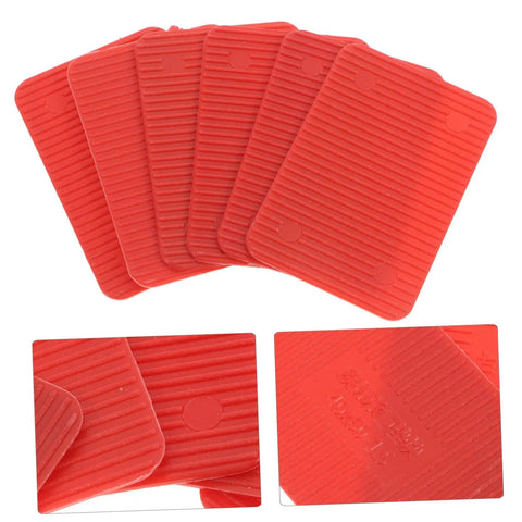 100 Pcs Plastic Door Frame Shims For Windows And Doors, red wedges, composite material, close-up view.