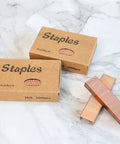 Rose Gold Staples Refill Kit With 7000 Premium 26 By 6 Standard Size Staples, 12mm Width, 7 Box Pack For Most Desk Staplers, Stainless Steel With Rose Gold Plating, Heavy Duty Office Supplies And Accessories. Two boxes of rose gold staples on marble surface.