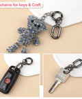 Heavy Duty Zinc Alloy Swivel Clip Locks Beefy Double Opening Snap Hooks For Bags Keys Lanyards Rock Solid Black Metal Fasteners For Daily Carry Gear Setup And Everyday Use Set Of Two with a decorative bear keychain and car remote.