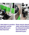 Close-up of Top Shelf Fully Automatic Round Bottle Labeling Machine With Snappy Touch Screen, showcasing photo-electric detection feature.