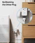 Real Deal Six Port Outlet Extender Surge Protector With Manual Switch And 360 Swivel Head in use behind furniture with clear access to other plug.