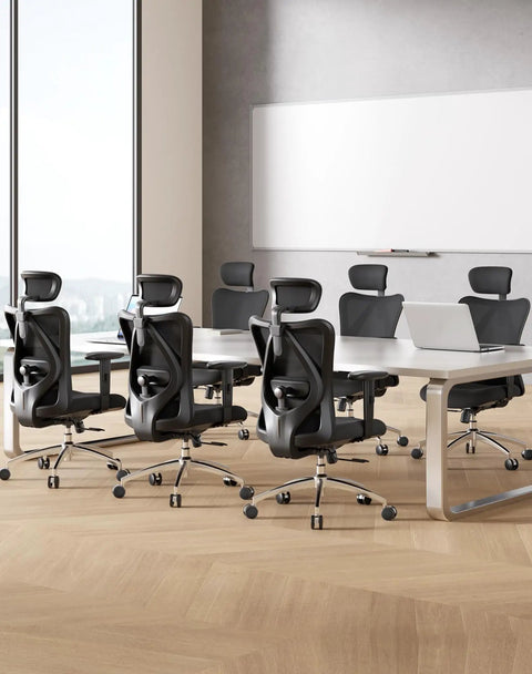 Conference room with several All Day Comfort Ergonomic High Back Mesh Desk Chairs with Adjustable Headrest around a large table