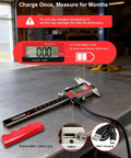 6-Inch Digital Caliper with USB-C Rechargeable Backlight LCD on a workbench, showing display and charging cable