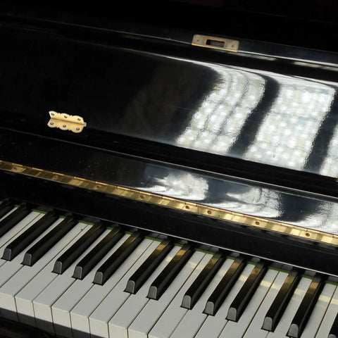 Golden Brass Piano Music Stand Hinges With Thick Bearings Old-School Vintage Style on black piano lid