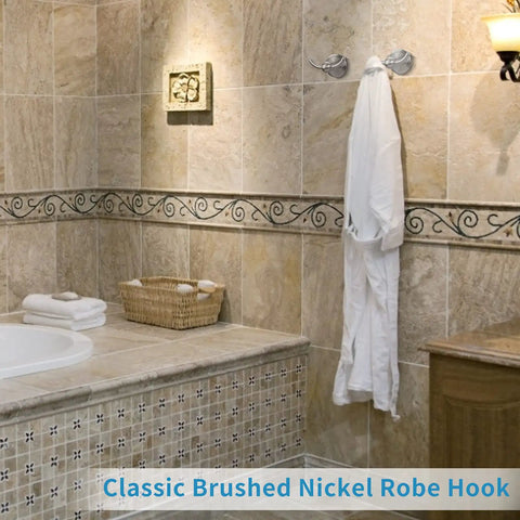 Bathroom with brushed nickel wall mount towel hooks set holding white robe