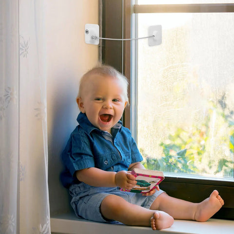 Child near window with 2 Pack Kidproof Safety Locks For Cabinets And Windows With Fall Prevention And Window Limiter Durable ABS