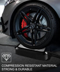 Car wheel on Level One Portable EV Charger 15 Amp 110 Volt With 21 Foot Extension Cord, showing compression resistance.
