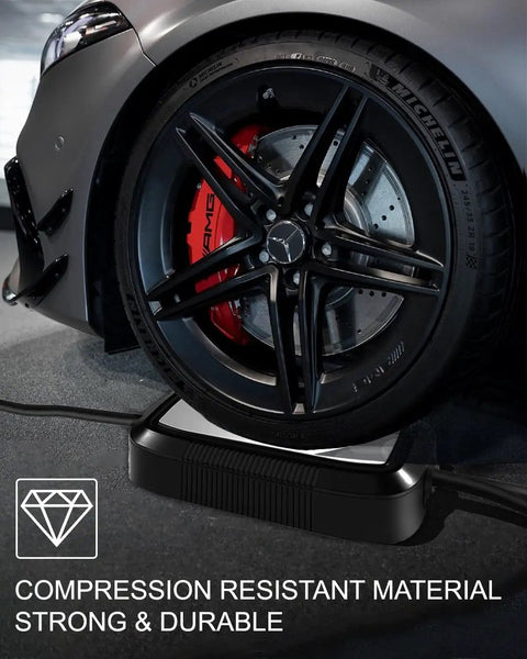 Car wheel on Level One Portable EV Charger 15 Amp 110 Volt With 21 Foot Extension Cord, showing compression resistance.
