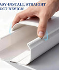 Hand installing 17 Foot Mini Split Line Set Cover Kit In White Durable PVC, showing straight duct design for mini split systems.