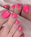 CurvLife Hot Pink Press On Toenails Short Square Glossy Soft Gel Fake Nails With Adhesive Tabs Natural Fit Reusable Salon Quality Toe Nails For Women Electric Fuchsia super cute glossy finish on toes.