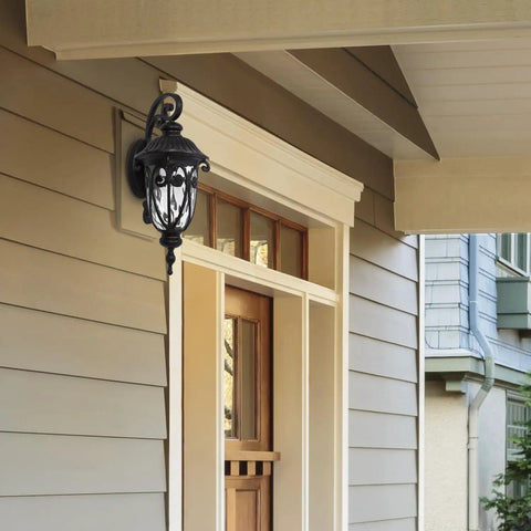 Viviana Collection Outdoor LED Wall Lantern In Oil Rubbed Bronze Finish mounted on house exterior near door.