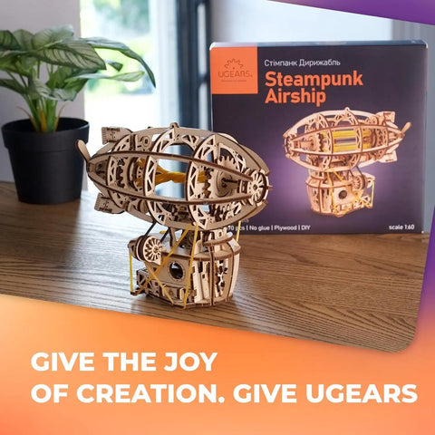 Steampunk Airship 3D Wooden Puzzle Kit Dope No Glue Required DIY Zeppelin Model displayed with box on wooden table