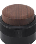 Top Tier 51Mm Black Coffee Distributor And Espresso Tamper For Baristas Stainless Steel Tool close-up view of wooden top.