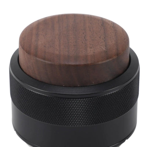 Top Tier 51Mm Black Coffee Distributor And Espresso Tamper For Baristas Stainless Steel Tool close-up view of wooden top.