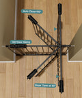 Top view of extra wide baby gate for doorways and stairs, pressure mounted black metal walk through design with swing door at 90°.