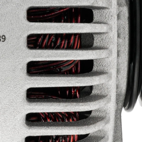 Close-up detail of Alternator Compatible With Lexus RX300 1999 2003 And Highlander 2001 2003 3.0L 100 Amp 12V CW Rotation 6 Groove Pulley S6 High Output Replacement That Just Works For Reliable Electrical Charging showing windings through vent.
