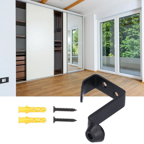 Rock Solid Stainless Steel Door Stopper With Hook, wall-mounted, black finish with screws and plugs, shown in room setting