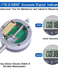 Electronic digital dial indicator with magnetic base and long arm; silver housing, green PCB interior, measures 0-1 inch (25.4 mm).