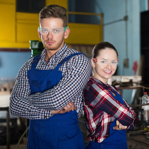 Two workers wearing 100 Pack Bulk Safety Glasses Featuring Bully Proof Polycarbonate Lenses And Heavy Duty Scratch Protection For Job Sites And Weekend Rigs Rainbow Mix Set.