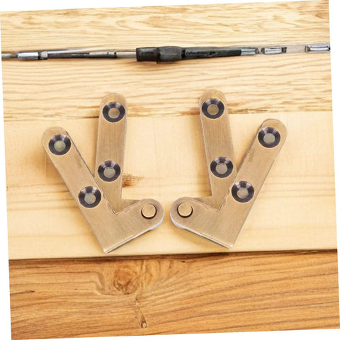 Hidden Brass Door Hinge 2 Pack For Secret Doors And Bookcases, shown uninstalled with bronze finish on wood background.
