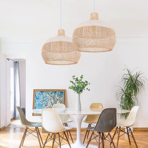 Dining area with Rattan Chandelier 1 Light Boho Coastal Wicker Handwoven Pendant Light For Kitchen Dining Room Restaurants 15.74 Inch Wide 15.74 Inch High Eco Friendly Natural Material With White Accent Stripes hanging over table.