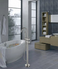 Sleek Floor Mounted Freestanding Tub Filler Faucet with Handheld Shower in Brushed Nickel Finish in modern bathroom.