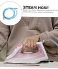 Person using steam iron with high temperature steam hose for steam irons, heavy duty high pressure flexible steam tube visible