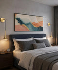 XYDikssn Gold Wall Sconce, Hardwired Wall Light with Brushed Brass and Clear Ribbed Glass Shade next to bed in modern bedroom.