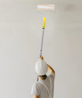 Hassle Free Detachable Paint Roller With Extendable Telescopic Handle For Ladder Free Wall Painting and Craft Prints in use.