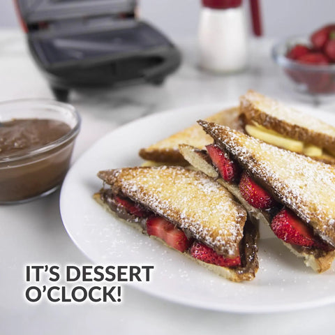 Cute And Compact Personal Sandwich Maker, Non Stick Electric Panini Press with dessert sandwiches filled with strawberries.