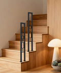 U Shaped Wrought Iron Stair Handrail Featuring Tough As Nails Rectangle Railing With Rock Solid Non Slip Base For Indoor Outdoor Porch Deck Loft Safety Support Two Pack Matte Black on wooden stairs.