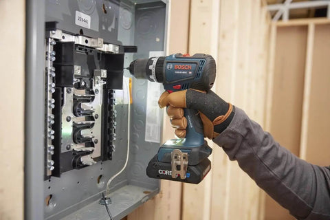 Rock Solid 1/2 Inch Hammer Drill Driver Kit Brushless Motor 565 In-Lbs Torque Core18V Battery used for installing electrical components.