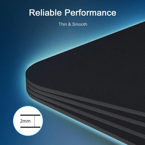 Close-up view of black square mouse pad, smooth surface, non-slip rubber base; "Black Square Mouse Pad with Non Slip Rubber Base Smooth Polyester Surface for Office Work Gaming Minimalist Desk Accessory"