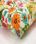 Close-up of bright floral indoor outdoor tufted wicker chair pad with ties set of 2 15.5 x 16 inches cushions pattern