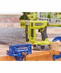 Heavy Duty Cordless Electric Stapler Beast For Upholstery Carpet Home Decorative Projects Tool Less Depth Control on workbench with wire.