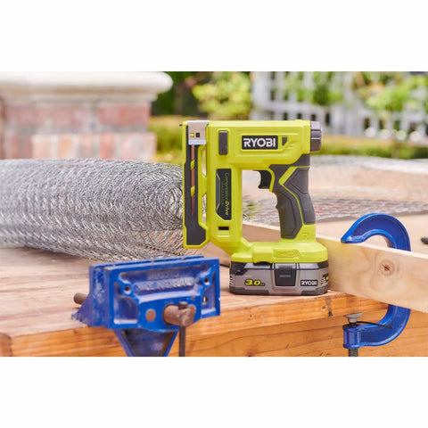 Heavy Duty Cordless Electric Stapler Beast For Upholstery Carpet Home Decorative Projects Tool Less Depth Control on workbench with wire.