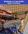 Hand using rotary tool on metal with diamond wheel; part of Must-Have Rotary Tool Bits Kit For Dremel And Other Brands, 508-Piece Universal Set.