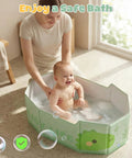 No Sweat Portable Folding Toddler Bathtub Equipped With Reliable Temperature Indicator Sticker And Swift Side Drain Valve For Effortless Rinsing And Compact Home Use with baby enjoying a bath.