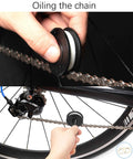 Using 5 In 1 Dummy Hub Bicycle Tool Kit: Chain Keeper, Frame Protector, Oiling Chain, Quick Ruler, Brake Pad Spacer and Storage for 12mm Through Axle Maintenance on bike chain.
