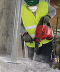 Worker using Beast 120 Volt SDS Max Corded Rotary Hammer Drill Kit With AVR Vibration Reduction Includes TE 70 Rotary Hammer in construction site