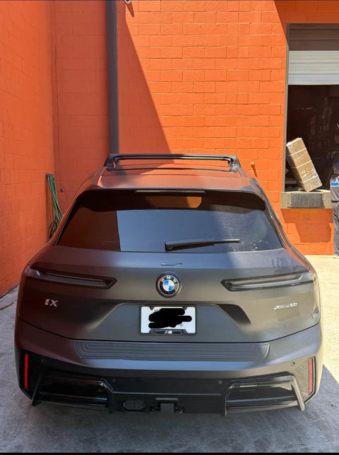 Rear view of BMW iX with Roof Rack Cross Bars For iX 2020 And Up No Drilling Aluminum T Slot Design Lockable 330 Lbs Load