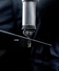 Top Shelf 18V Cordless Rivet Nut Gun With Hella Precision Adjustable Settings being used on metal sheet with a rivet.