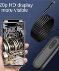 Pro Grade Dual Lens Wireless Endoscope For Engine Bay And Pipe Inspections showing phone with 720p HD display and cable.