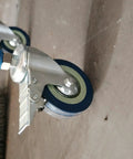 Close-up of Heavy Duty Swivel Caster Wheels With Locking Brakes Set Of Four Threaded Stem Quiet Rubber Units for carts.