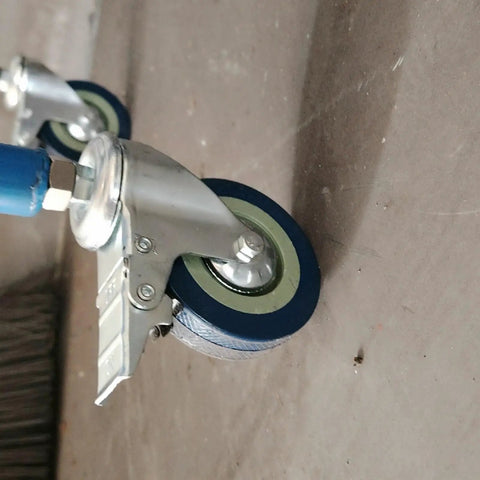 Close-up of Heavy Duty Swivel Caster Wheels With Locking Brakes Set Of Four Threaded Stem Quiet Rubber Units for carts.