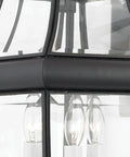 Close-up of Newbury 23 Inch Outdoor Wall Lantern, 3 Light Mystic Black With Clear Beveled Glass and solid brass construction.