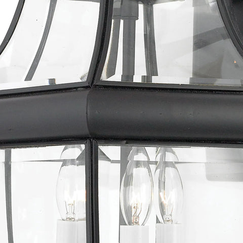 Close-up of Newbury 23 Inch Outdoor Wall Lantern, 3 Light Mystic Black With Clear Beveled Glass and solid brass construction.