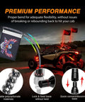 Lit 3Ft RGB LED Whip Light And Four Pack Rock Lights Kit installed on ATV at dusk showing chasing patterns and flags
