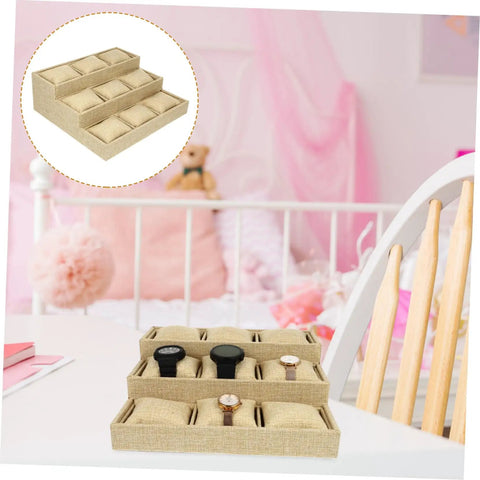 Slick Linen Watch Organizer Tray With Nine Generous Grids For Snagging And Showcasing Your Favorite Timepieces Plus Luxury Jewelry Collection Top Shelf Desk Storage Solution on a table with watches.