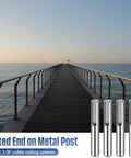 50 Pack 316 Marine Grade Stainless Steel Invisible Cable Railing Kit For 1/8 Inch Rope attached to metal posts on a deck.